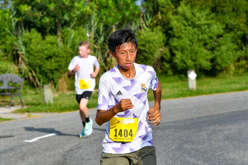 Christian Rivera, 13, runs a 5K in 22 minutes.